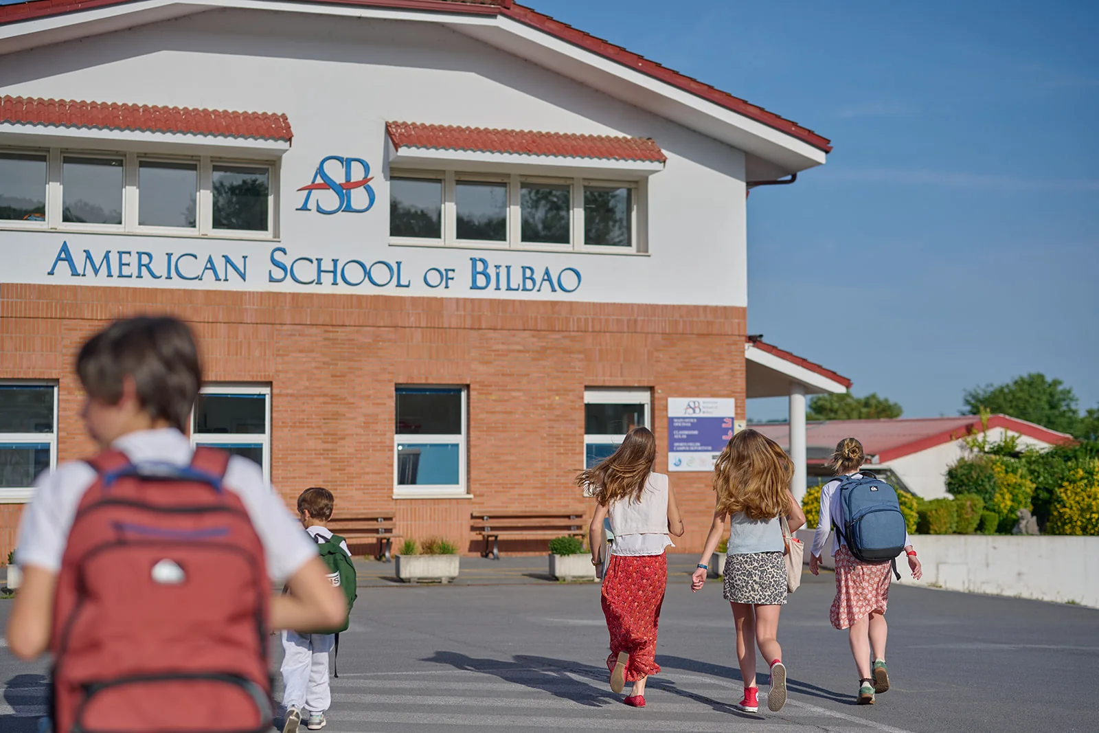 Family approaching school